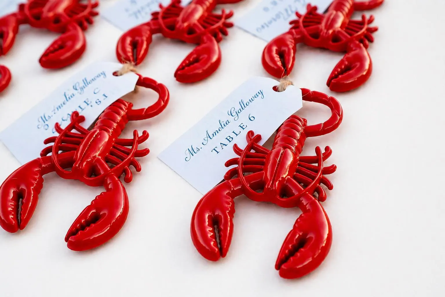 Lobster Bottle Opener Seating Chart — handcrafted Seating Charts for coastal & beach weddings by Shoreline Bride, Boston MA